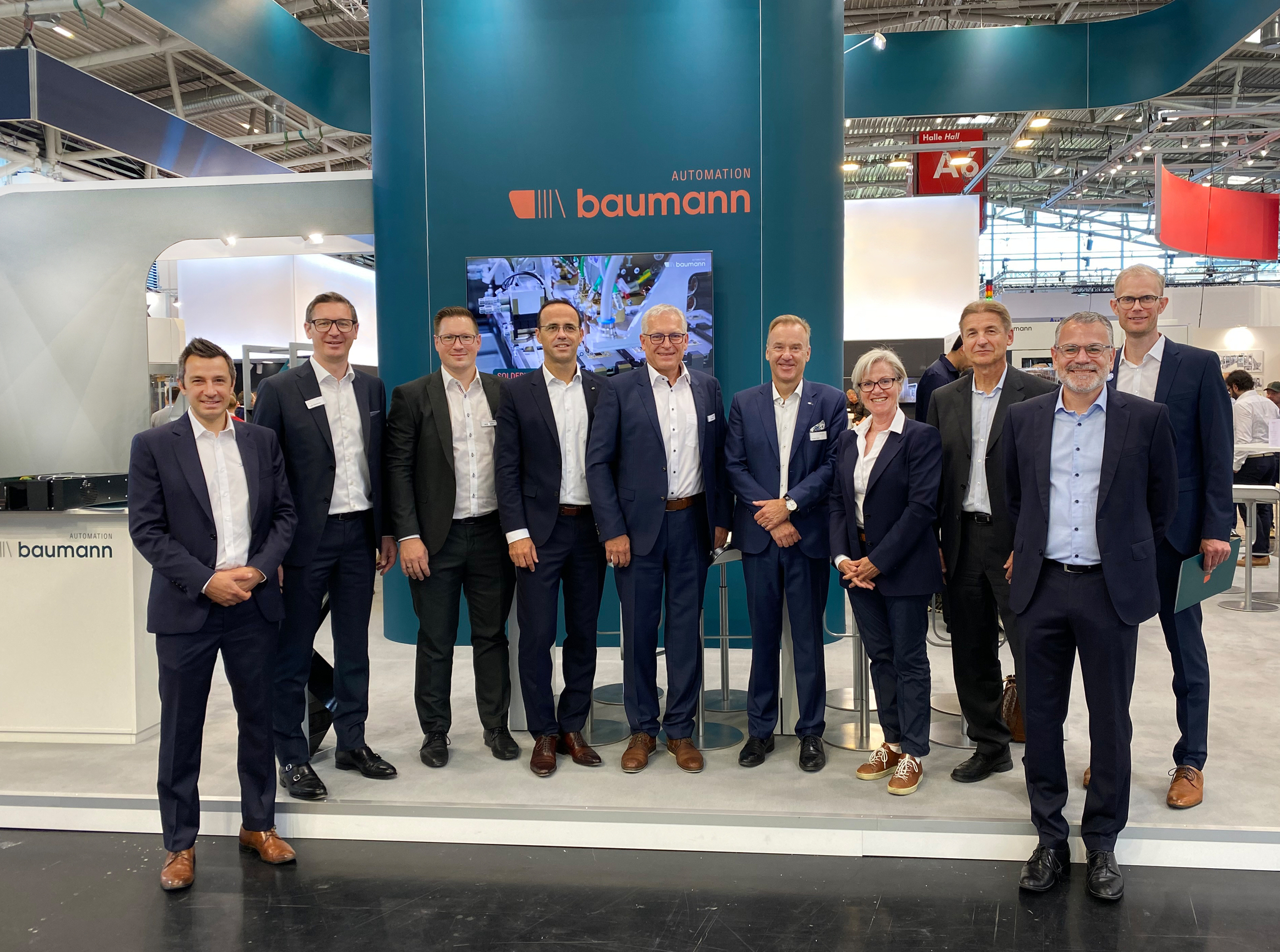 f.l.t.r. Adrien Brouillard (Global Business Head – GI & Services Stäubli), Peter Pühringer (Managing Director Stäubli Tec-Systems Robotics), Marco Melischko (Group Sales Manager Assembly Solutions Baumann Automation), Christophe Coulongeat (Executive President Stäubli Robotics), Karl Ebnet (CEO Baumann Automation), Gerald Vogt (CEO Stäubli International AG), Dr. Evelyne Saupper (Member of the Board of Directors Stäubli), Dieter Widmer (Member of the Board of Directors Stäubli), Roger Schnüriger (CFO Stäubli International AG), Johannes Seitz (Area Sales Manager Stäubli Robotics)